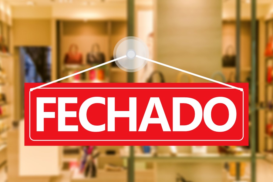 placa mostrando o fechamento de uma empresa e baixa de empresa