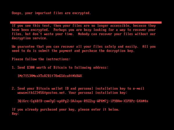 Tela vermelha do ransomware Petya/NotPetya exibindo mensagem de resgate, instruções de pagamento em Bitcoin e aviso de arquivos criptografados, representando um dos maiores ataques cibernéticos da história.