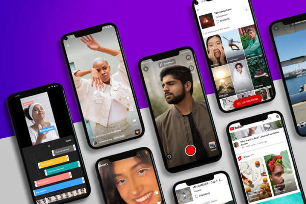 Vários smartphones exibindo vídeos do YouTube Shorts com criadores diversos, representando a tendência global de vídeos curtos, criativos e virais em 2025.